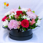 Roxana rosas y alstromerias en caja